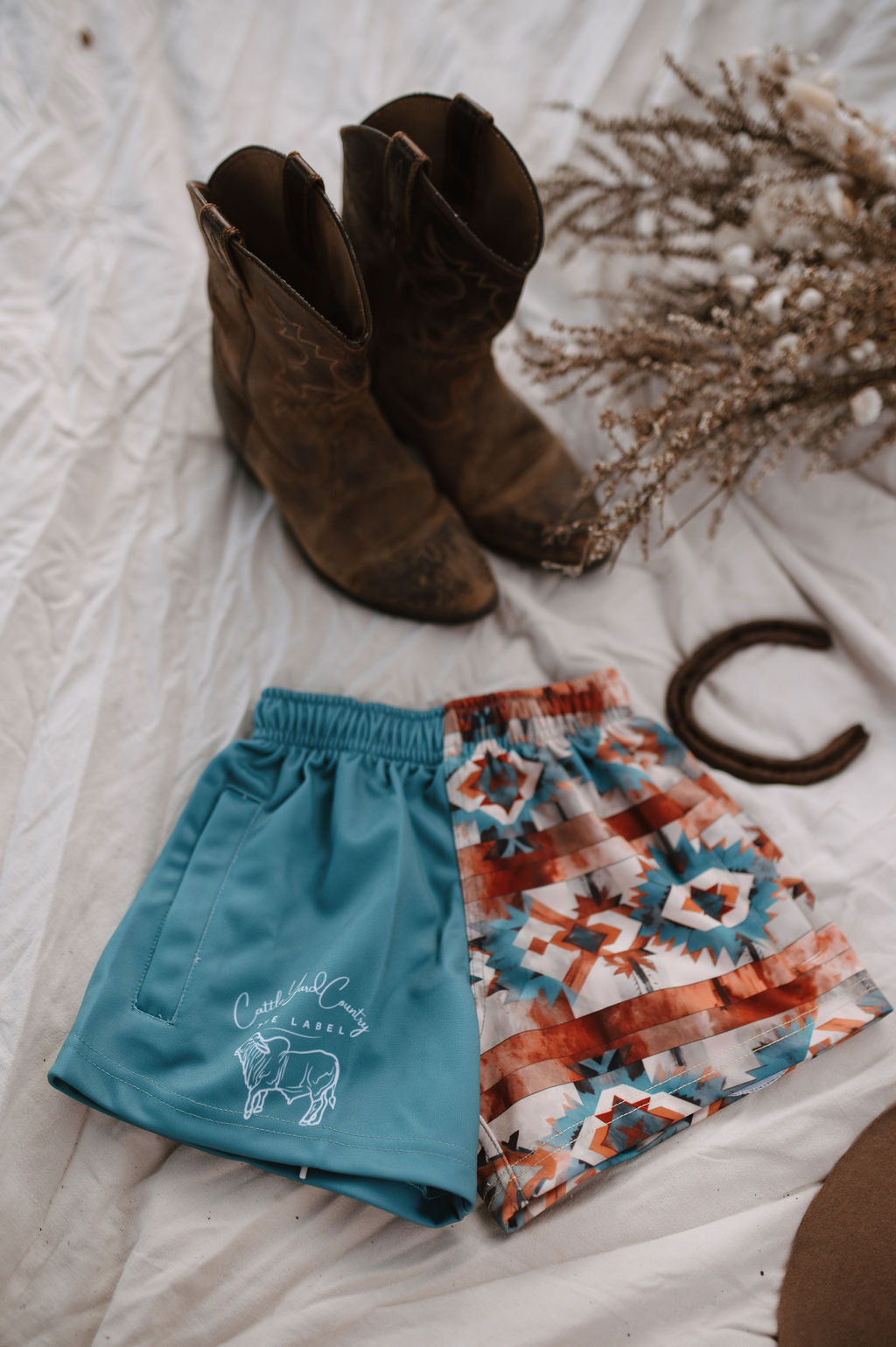 Aztec teal shorts