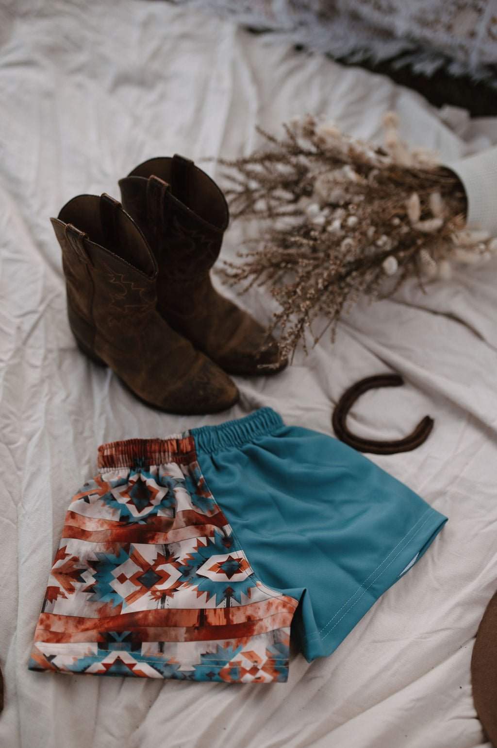 Aztec teal shorts